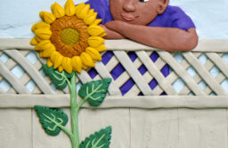 Plasticine art by Barbara Reid boy with a sunflower